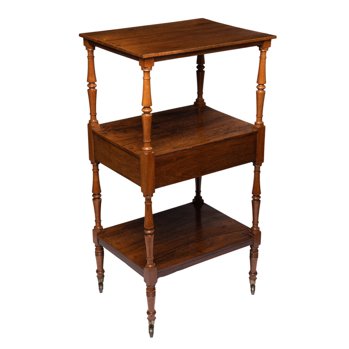 English three tier dumb waiter on brass castors in Brazilian rosewood (1810)