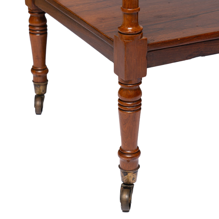 English three tier dumb waiter on brass castors in Brazilian rosewood (1810)