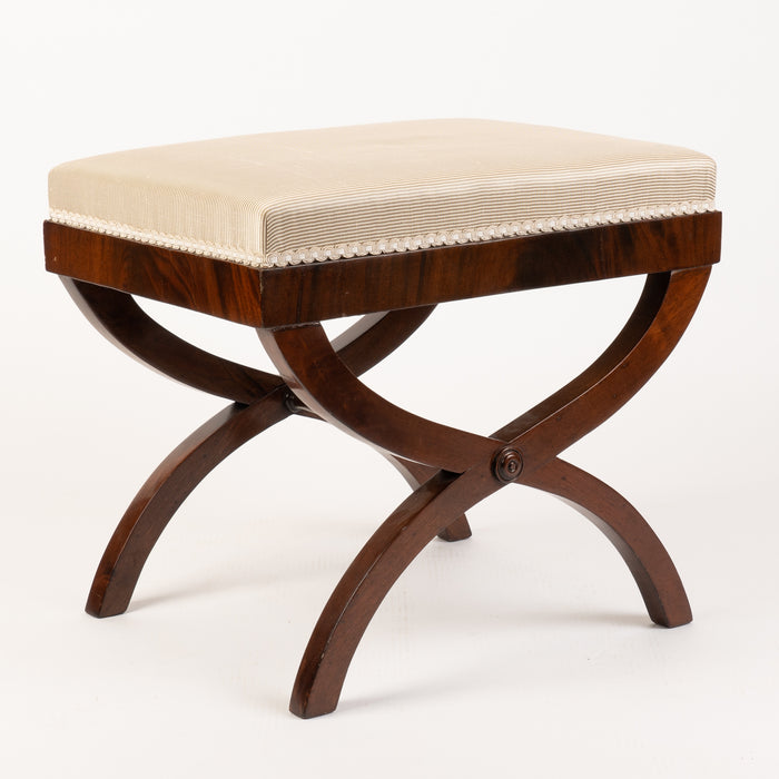 Upholstered American mahogany curule stool (1900-25)