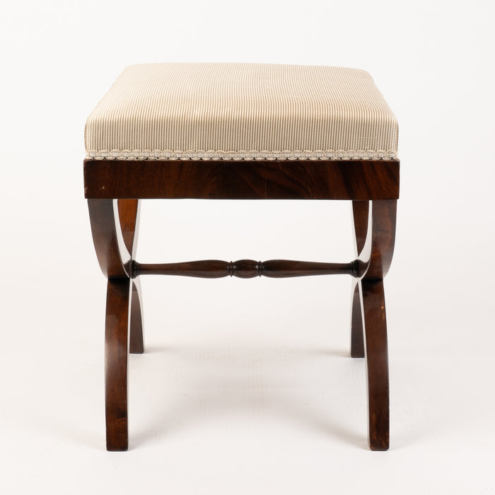 Upholstered American mahogany curule stool (1900-25)
