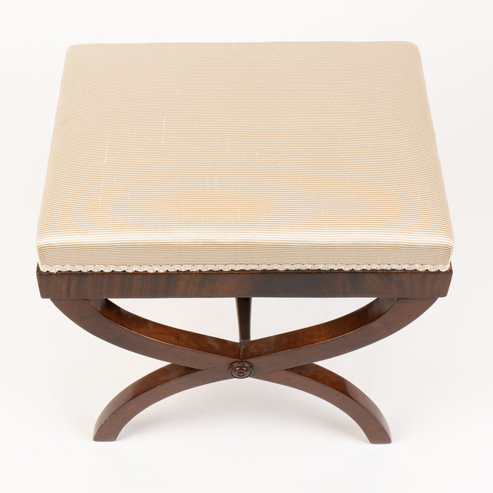 Upholstered American mahogany curule stool (1900-25)