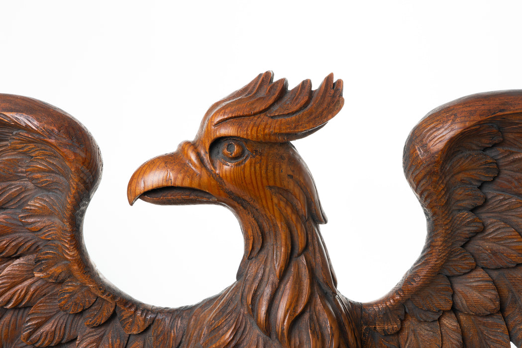 Large carved wooden eagle with wings spread (1820)