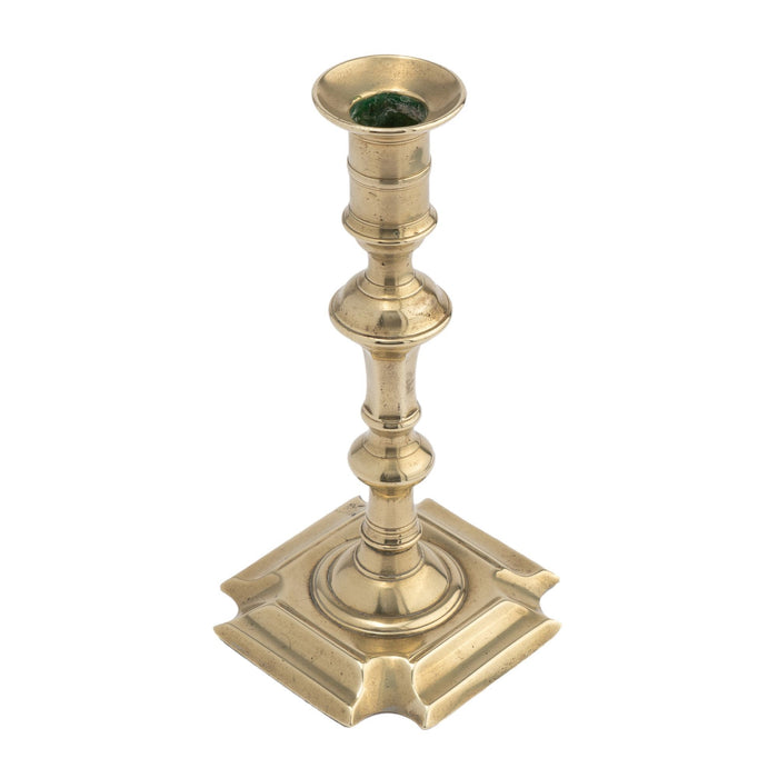 English Queen Anne brass candlestick (c. 1750-60)