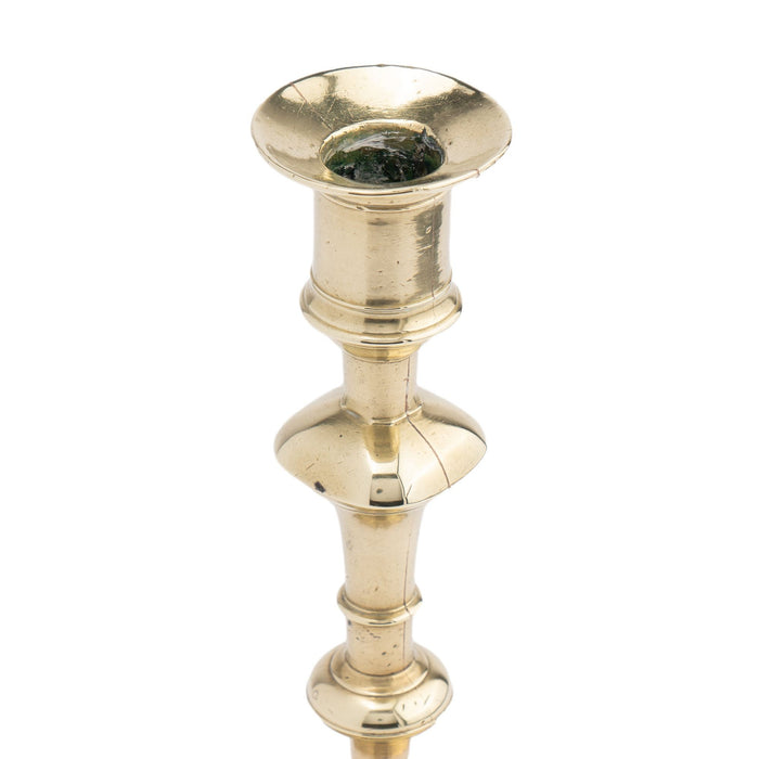 English cast brass Queen Anne candlestick (1740-50)