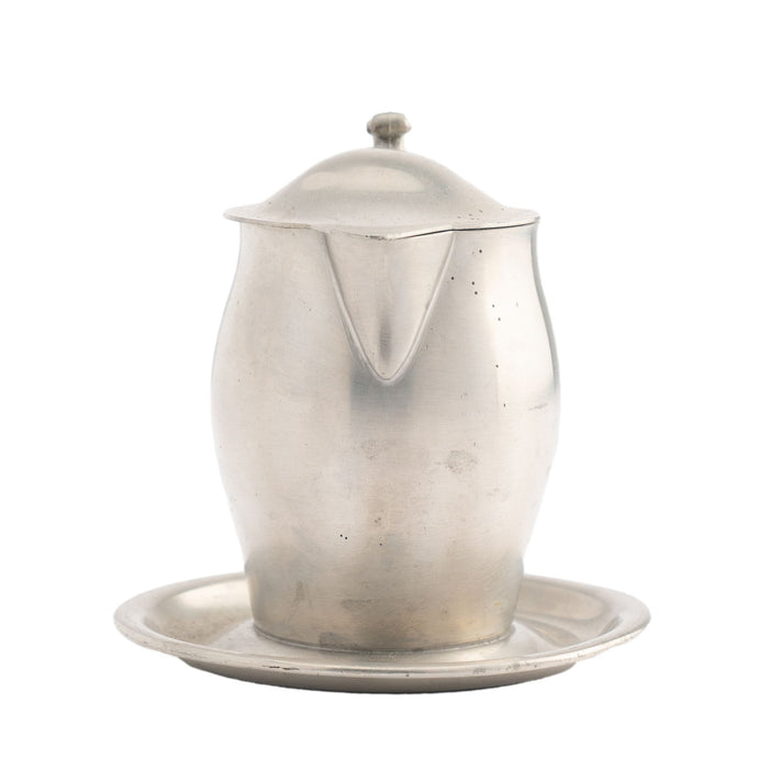 International Pewter creamer with hinged lid and attached tray (1920-30)