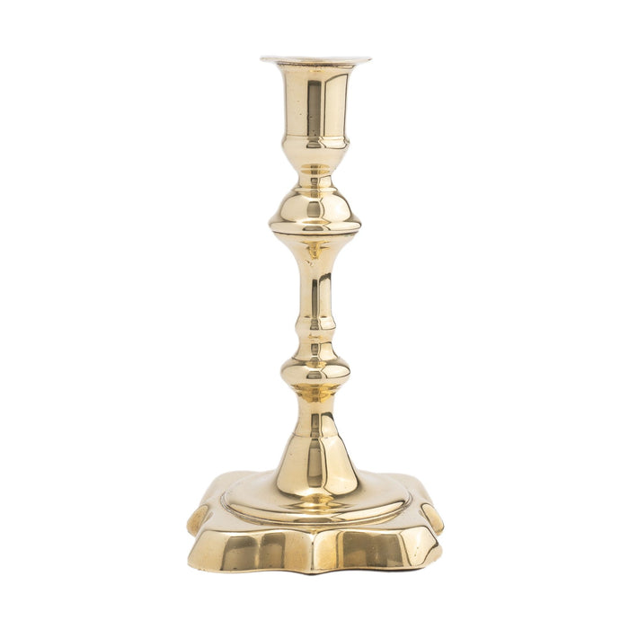 English brass Queen Anne candlestick (c. 1725)