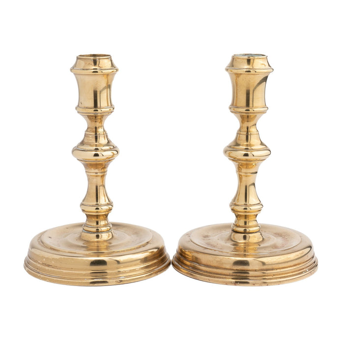 Pair of Essex Brass Academic Revival brass candlesticks (1900-25)