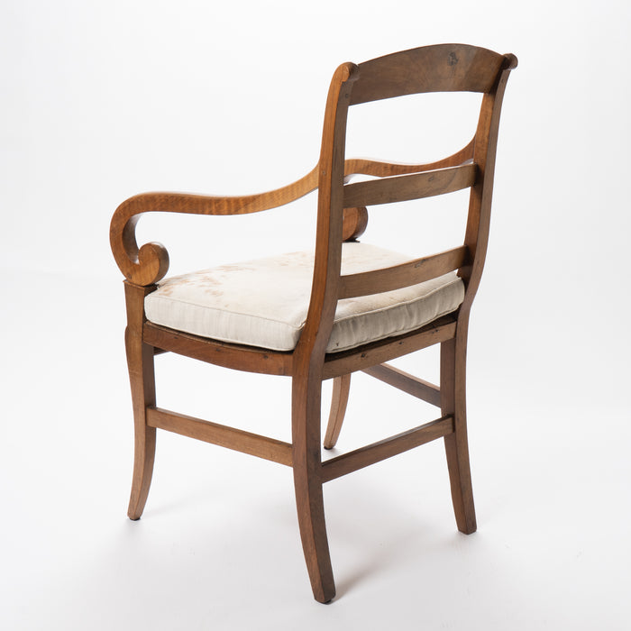 French cherry wood arm chair with rush seat and upholstered seat cushion (c. 1830)