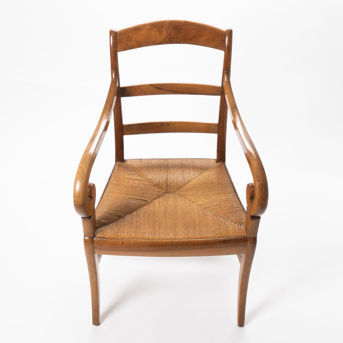 French cherry wood arm chair with rush seat and upholstered seat cushion (1830)