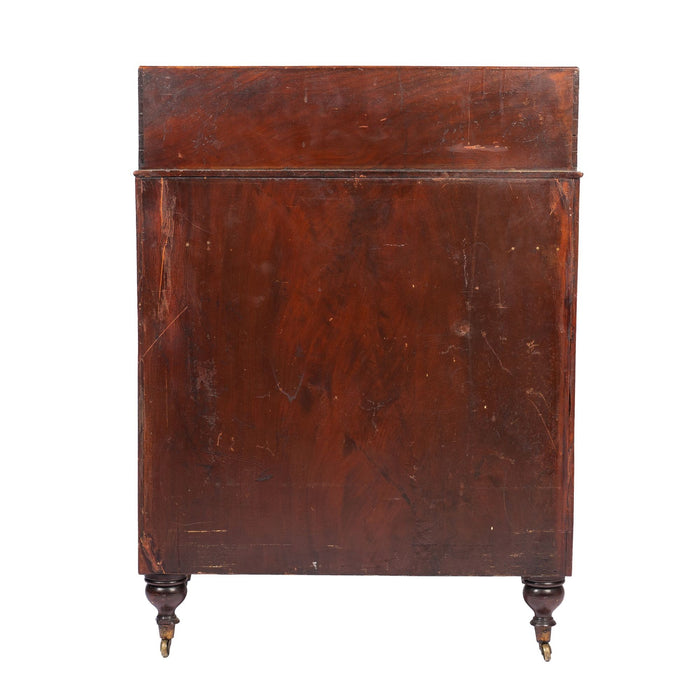 American mahogany demilune dressing stand on brass castors (1830)