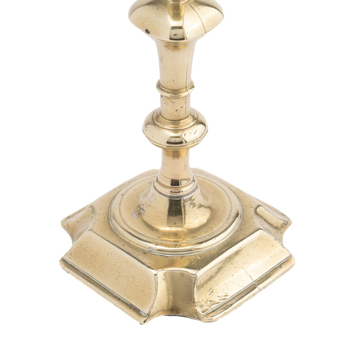 English cast brass Queen Anne candlestick (1740-50)