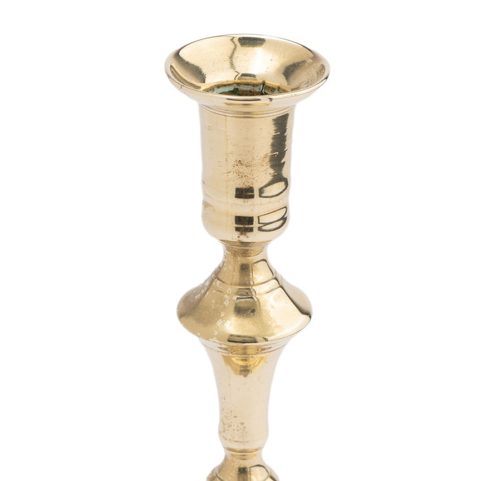 Cast brass Queen Anne scollop base candlestick (c. 1760)