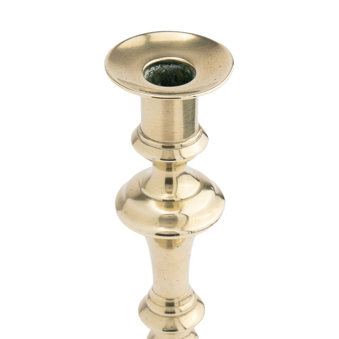 English Queen Anne brass candlestick with knob stem (1770)