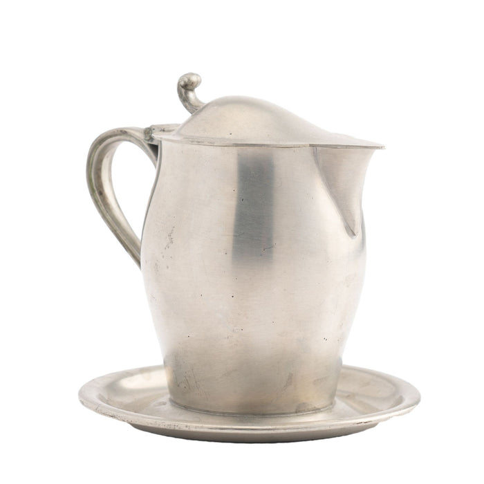 International Pewter creamer with hinged lid and attached tray (1920-30)