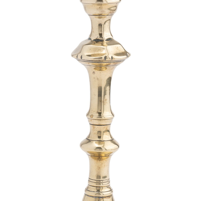 English Queen Anne cast brass candlestick (1770)