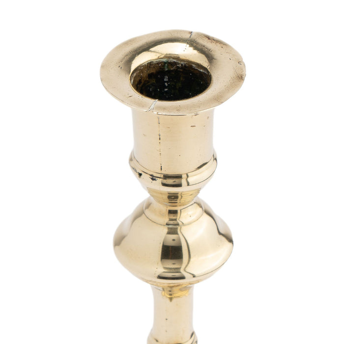 English brass Queen Anne candlestick (c. 1725)