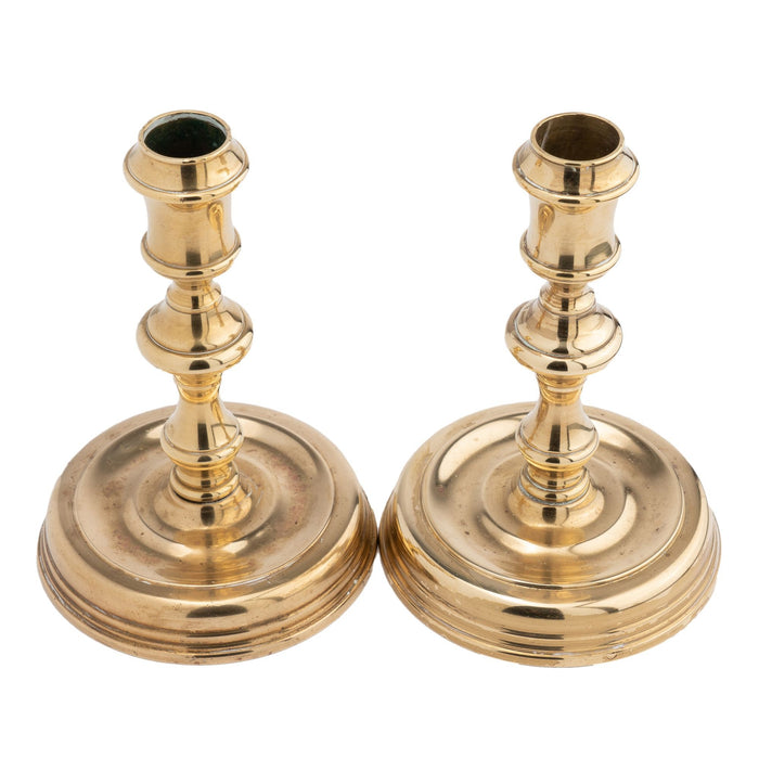 Pair of Essex Brass Academic Revival brass candlesticks (1900-25)