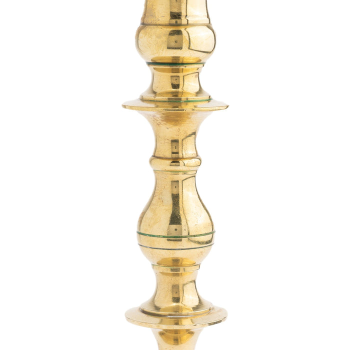 Continental core cast brass candlestick (1700's)