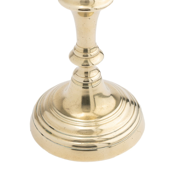 English Queen Anne brass candlestick with knob stem (1770)