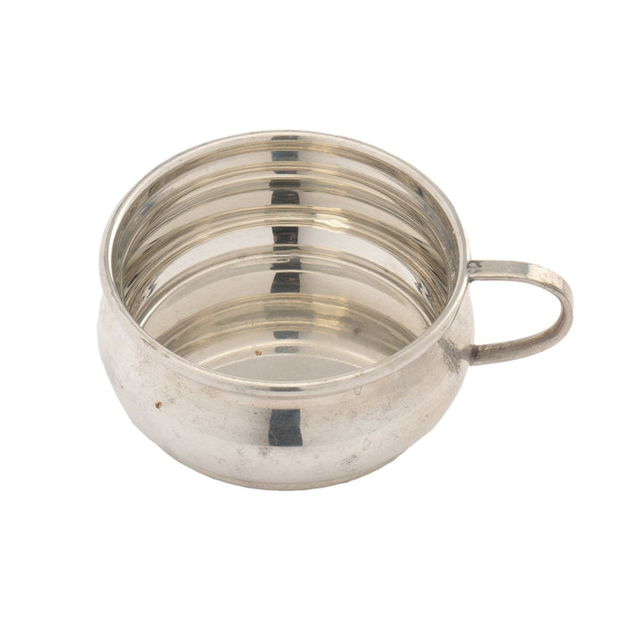 Polished pewter porringer by Queen Art Pewter (1900-50)