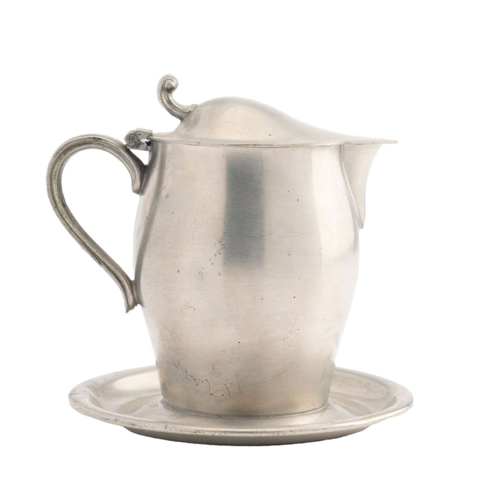 International Pewter creamer with hinged lid and attached tray (1920-30)