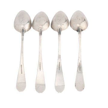 Ornate Silver Teaspoons, Four Spoons with Floral Handles, Arranged in a  Fan-like Manner and Connected