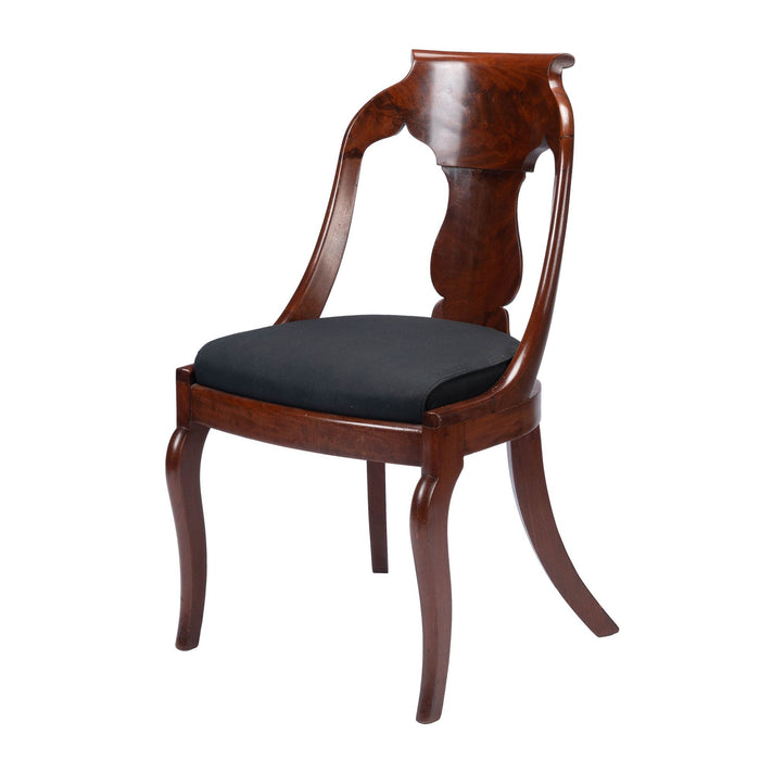 Pair of American mahogany upholstered slip seat gondola chairs (1830-35)