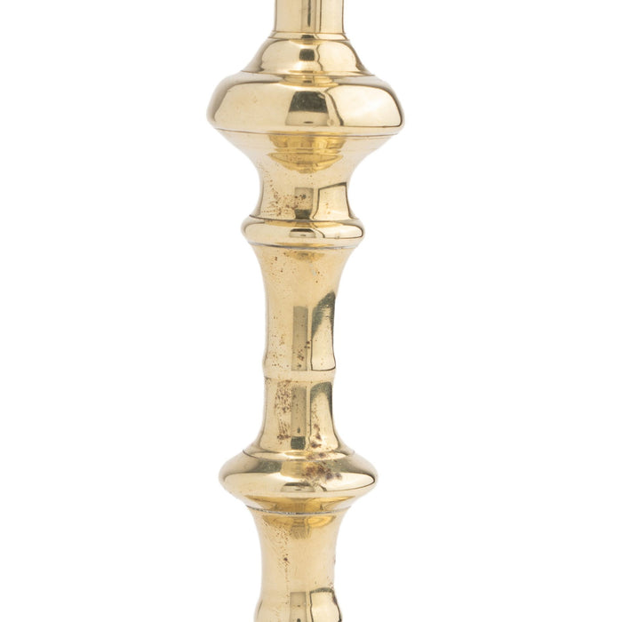Queen Anne cast brass swirl base candlestick, 1750-75