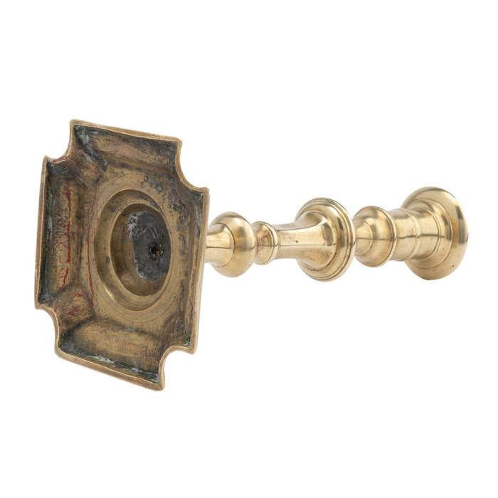 English Queen Anne brass candlestick (c. 1750-60)