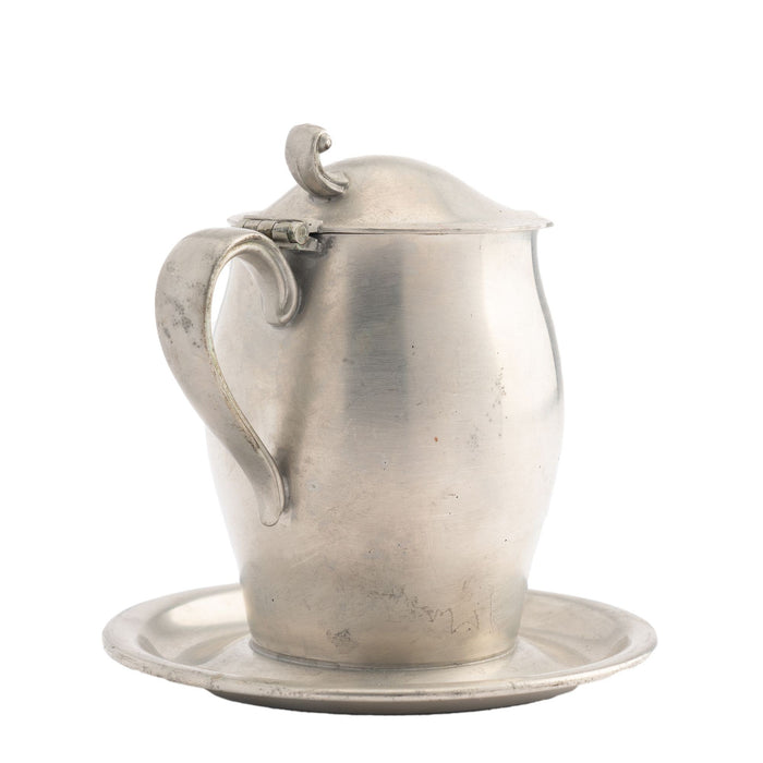 International Pewter creamer with hinged lid and attached tray (1920-30)