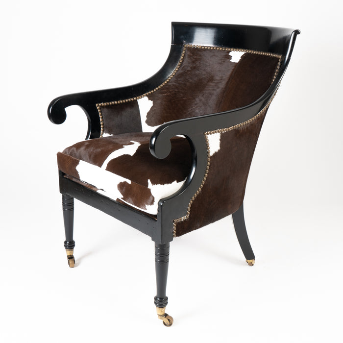 William IV ebonized mahogany framed gondola arm chair in calfskin (1825)