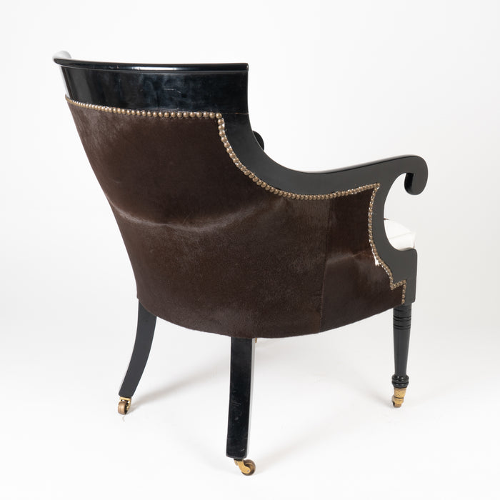 William IV ebonized mahogany framed gondola arm chair in calfskin (1825)