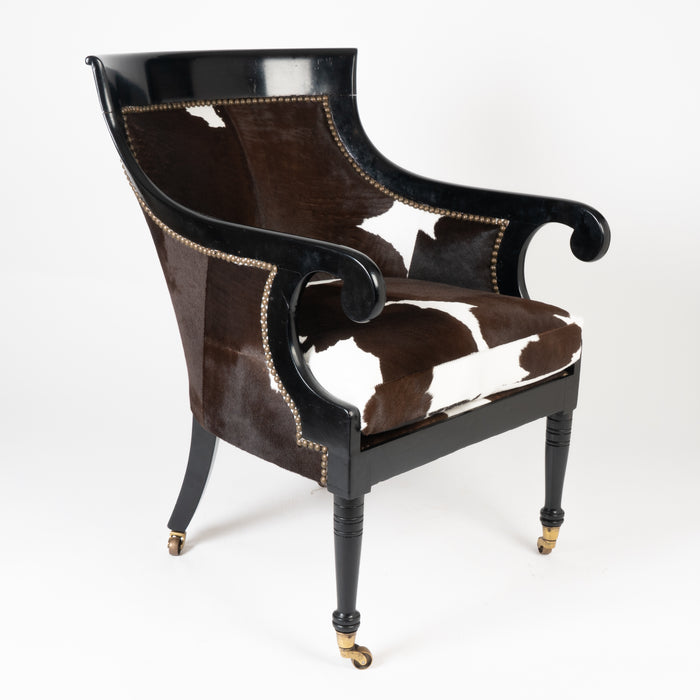 William IV ebonized mahogany framed gondola arm chair in calfskin (1825)