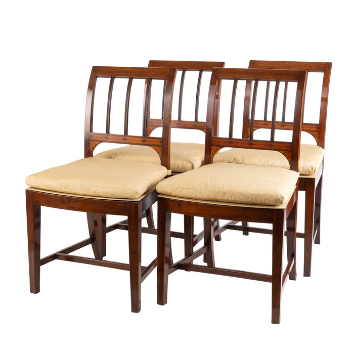 Set of four George III cane seat mahogany side chairs (1785)