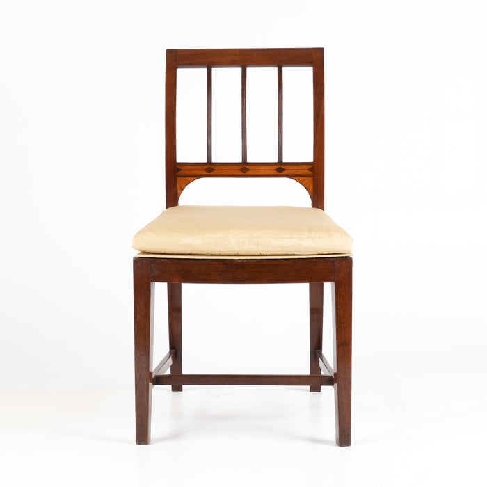 Set of four George III cane seat mahogany side chairs (1785)