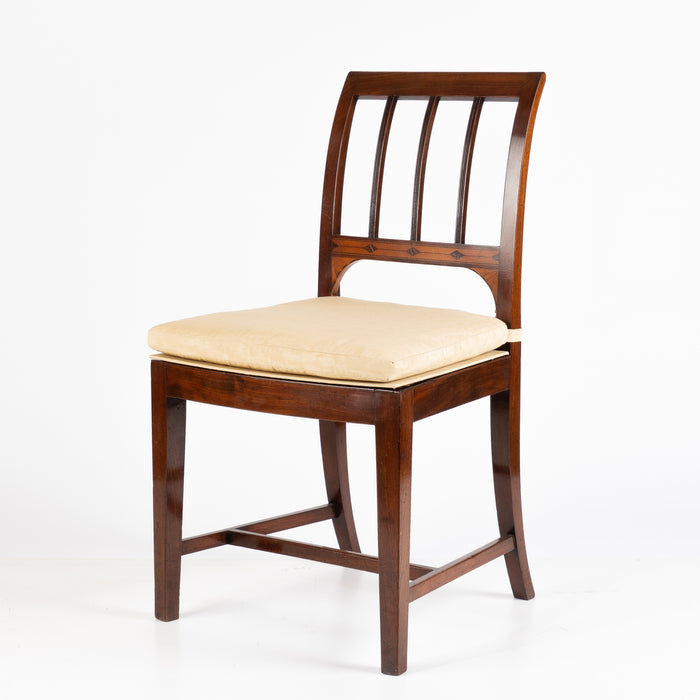 Set of four George III cane seat mahogany side chairs (1785)