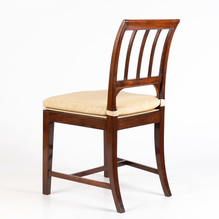 Set of four George III cane seat mahogany side chairs (1785)