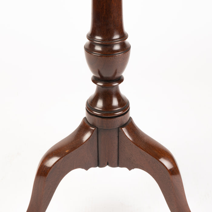 Chippendale mahogany circular tilt top candle stand (1770)