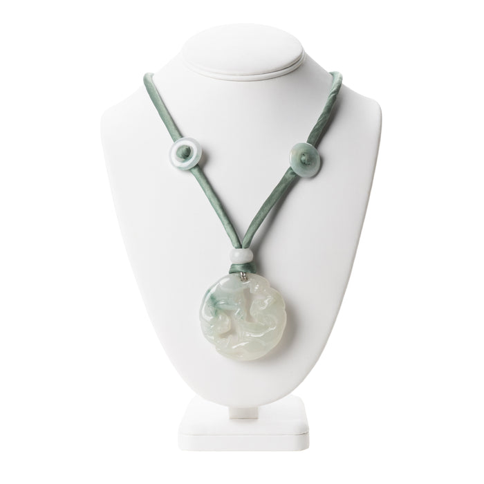 Chinese celadon jade carved and pierced circular pendant necklace (1912-1949)