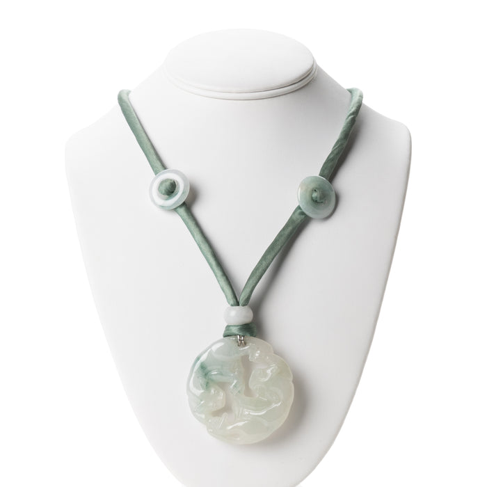Chinese celadon jade carved and pierced circular pendant necklace (1912-1949)
