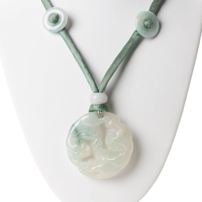 Chinese celadon jade carved and pierced circular pendant necklace (1912-1949)