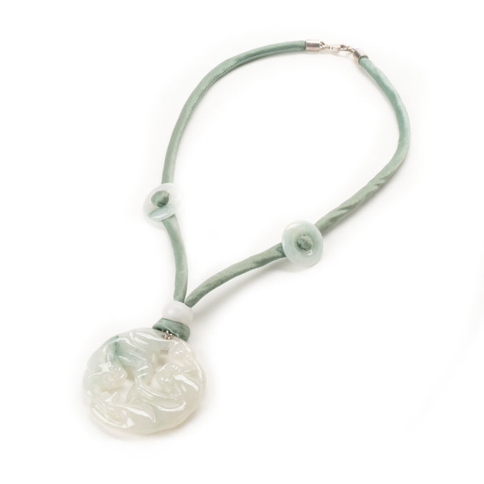 Chinese celadon jade carved and pierced circular pendant necklace (1912-1949)