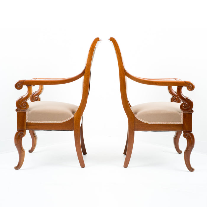 Pair of French Restoration mahogany fauteuils (c. 1820)