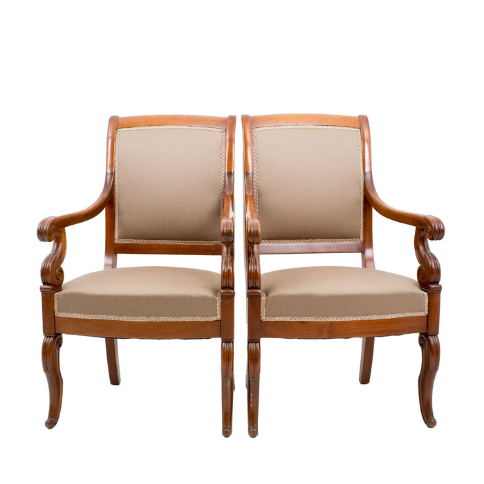 Pair of French Restoration mahogany fauteuils (1820)