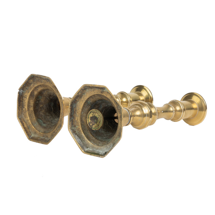 Pair of English brass candlesticks with octagonal bases (1825)