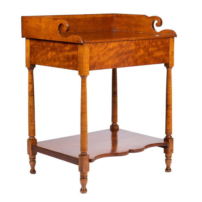 Philadelphia cherry wood dressing stand with splash on a conforming apron (1810-20)