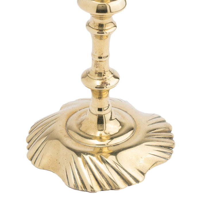 Queen Anne cast brass swirl base candlestick, 1750-75
