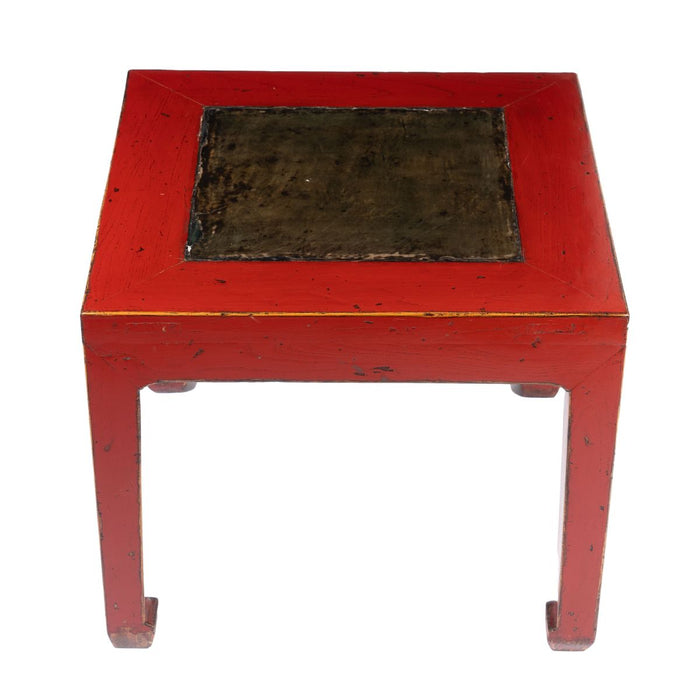 Chinese red lacquered square table fitted with inset stone top