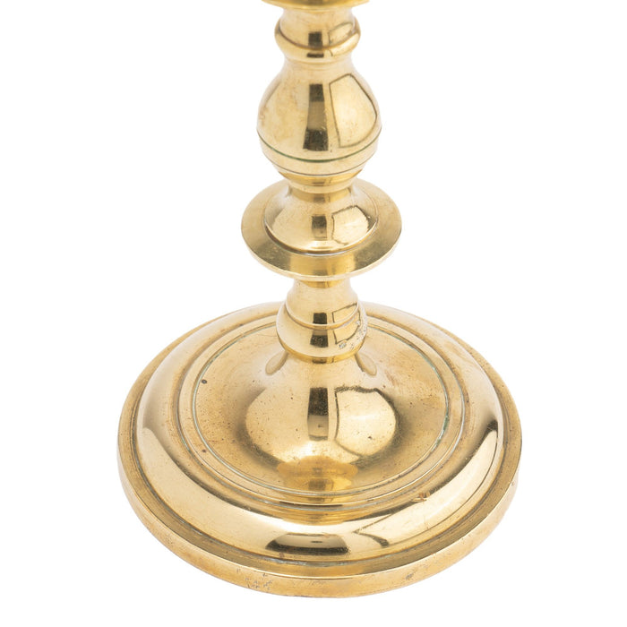 Continental core cast brass candlestick (1700's)