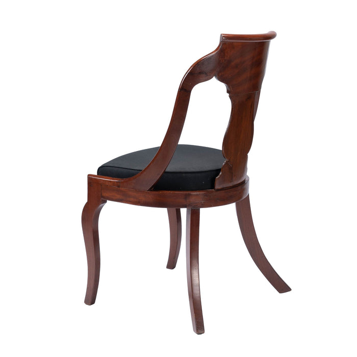 Pair of American mahogany upholstered slip seat gondola chairs (1830-35)